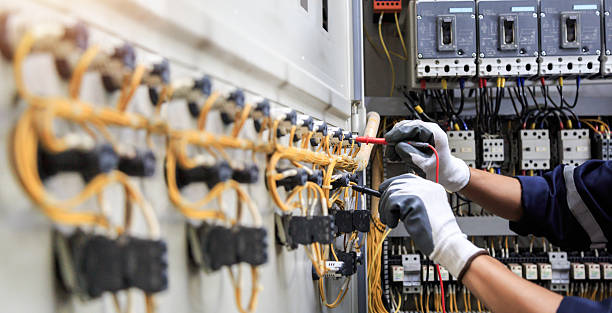 Professional Electrician technician working in Mangonia Park, FL